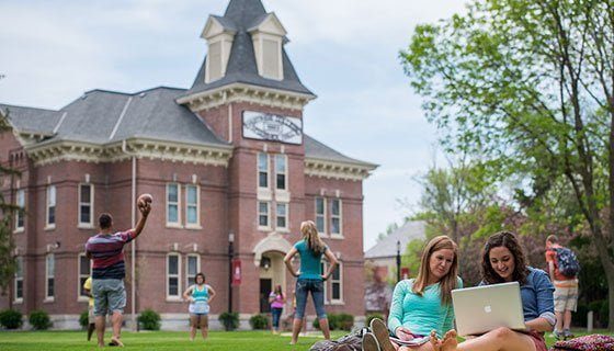 Students sitting in front of McCormick Hall